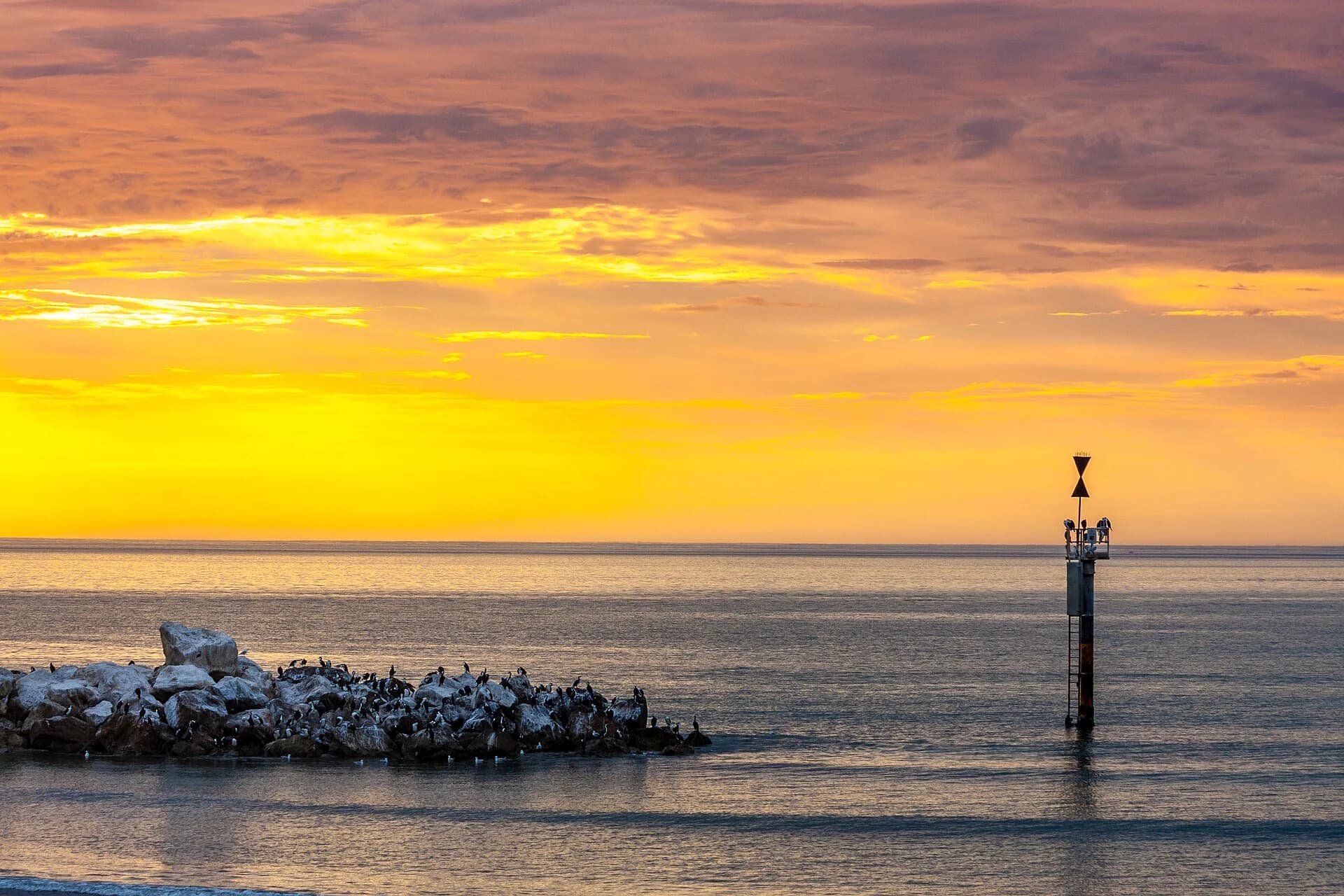 Golden sunset over the Gulf St Vincent coast near Glenelg, Adelaide