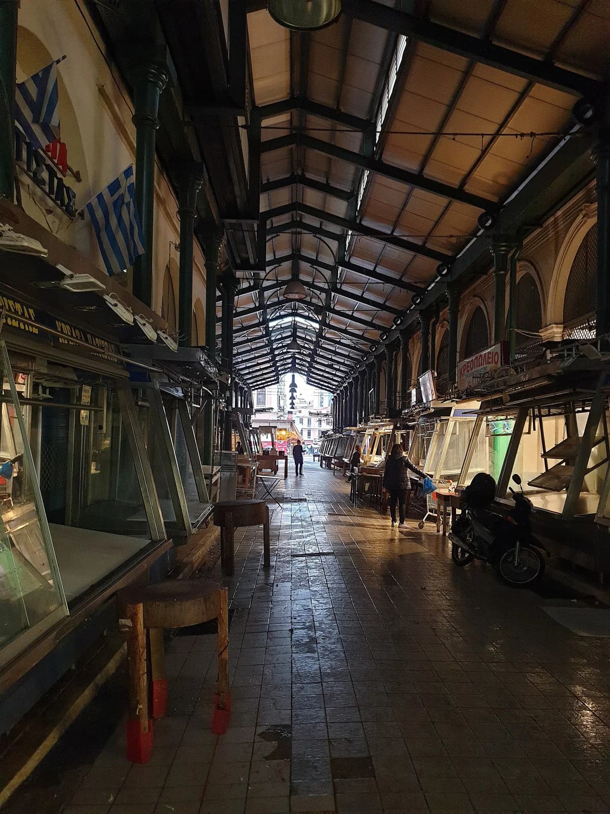 Market stalls and hanging meats inside Varvakios Central Market in Athens