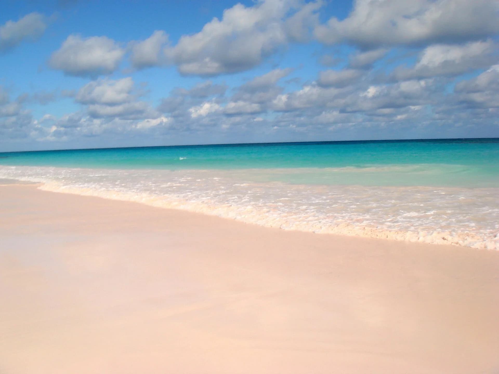 Pink Sands Beach on Harbour Island, Bahamas, with pale sand and turquoise water