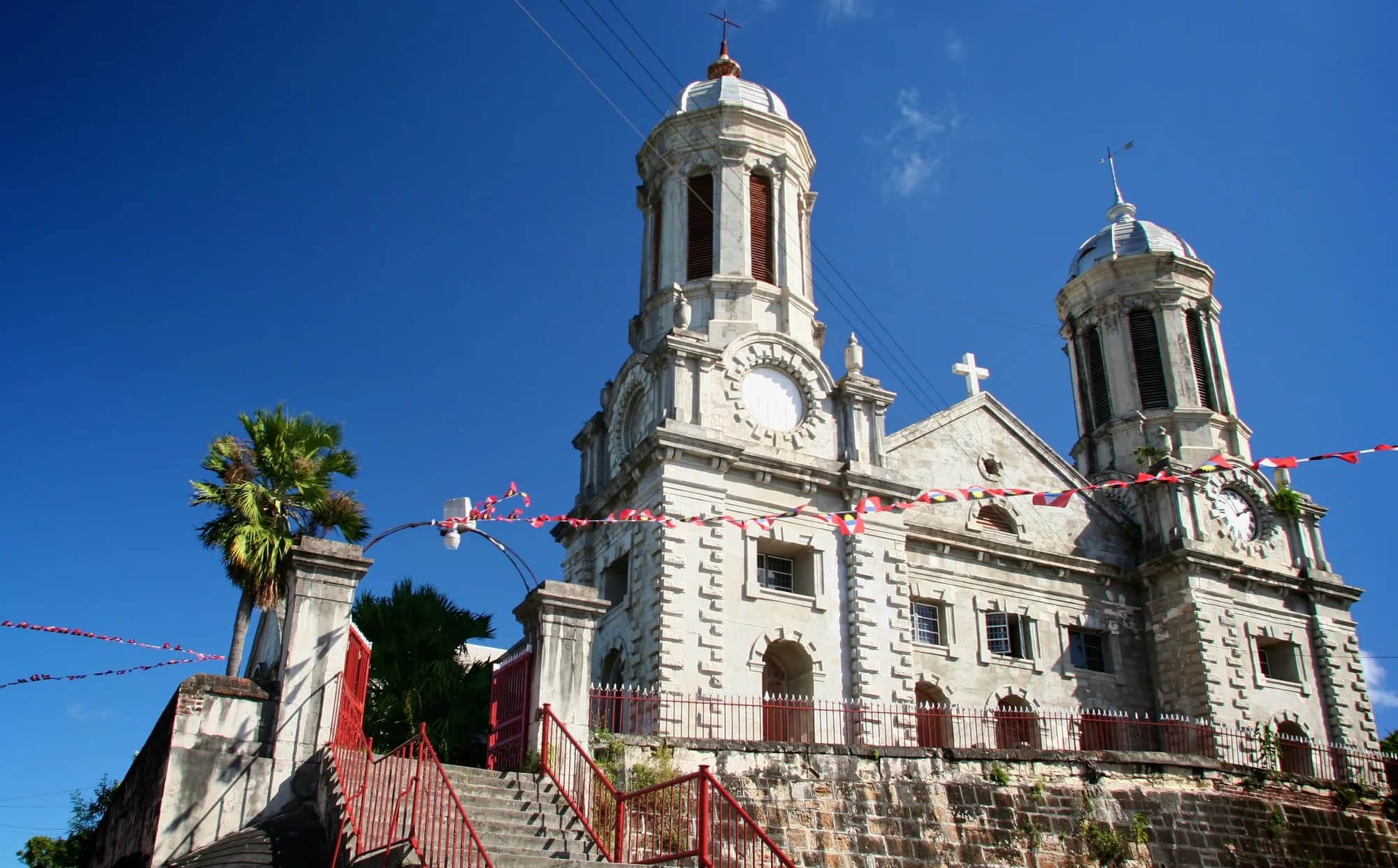 White twin towers and front steps of St John's Cathedral in Antigua